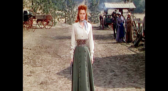 Alexis Smith as Maria Singleton, pistol at ready, determined to stand up to Morgan Lane in Montana (1950)