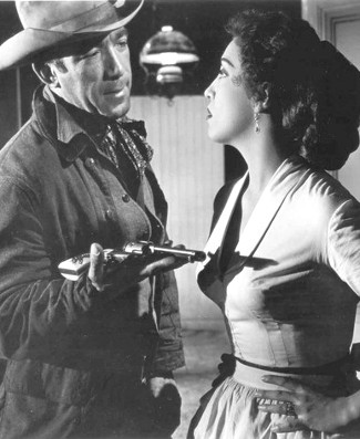 Anthony Quinn as Dave Robles with Katy Jurado as Estella in Man from Del Rio (1956)
