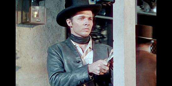 Audie Murphy as Billy the Kid, torn between a quest to revenge and his pledge to Jameson in The Kid from Texas (1950)