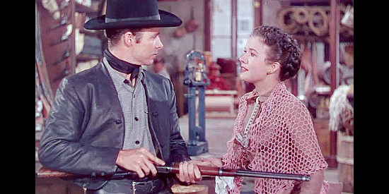 Audie Murphy as Billy the Kid with Gale Storm as Irene Kain, a discontent young wife in The Kid from Texas (1950)