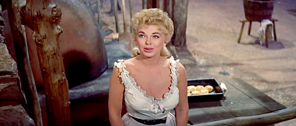 Barbara Nichols as Birdie, the former saloon girl who married a McDade brother in The King and Four Queens (1956)