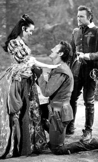 Barbara Rush as Princess Lucia, Jack Palance as El Tigre and Rex Reason as Montera in Kiss of Fire (1955)