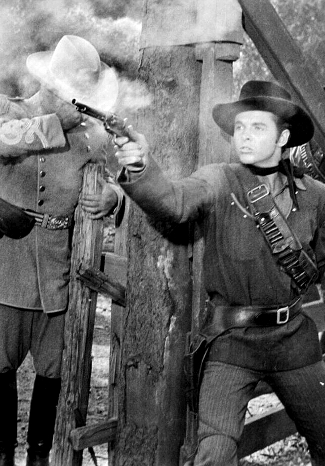 Brian Donlevy as Col. Quantrill and Audie Murphy as Jesse James in Kansas Raiders (1950)