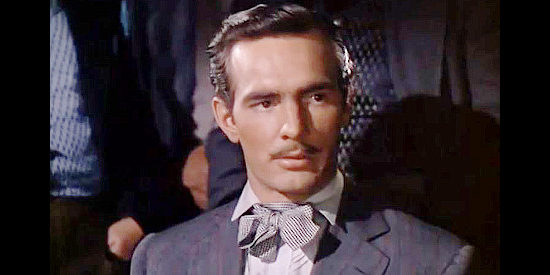 Dennis Weaver as Julian Conant, Ann's brother, about to bet more than he can afford to lose at the poker table in Mississippi Gambler (1953)