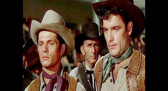 Dewey Martin as James Younger and James Best as his brother Cole, two of Jesse's companions in Kansas Raiders (1950)