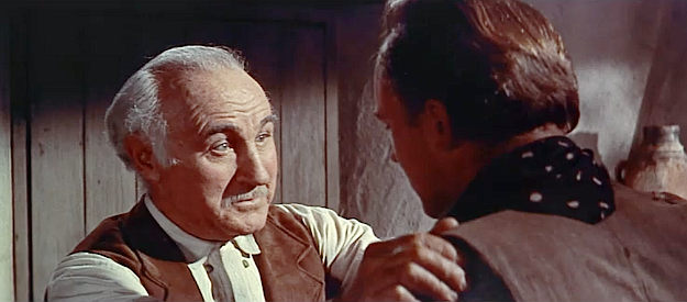 Donald Crisp as Alec Waggoman, pleading with Vic Hansbro to keep his son out of harm's way in The Man from Laramie (1955)