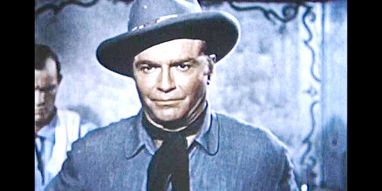 Donald 'Red' Barry as Jesse James, posing as cattleman J. Woodson to avoid detection in Little Creek, Mississippi in Jesse James' Women (1954)