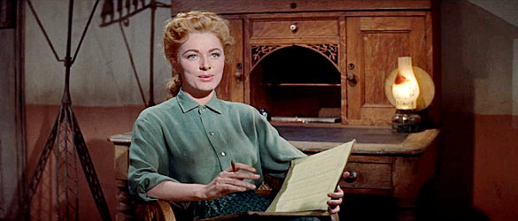 Eleanor Parker as Sabina McDade, wondering about the stranger visiting Wagon Mound in The King and Four Queens (1956)