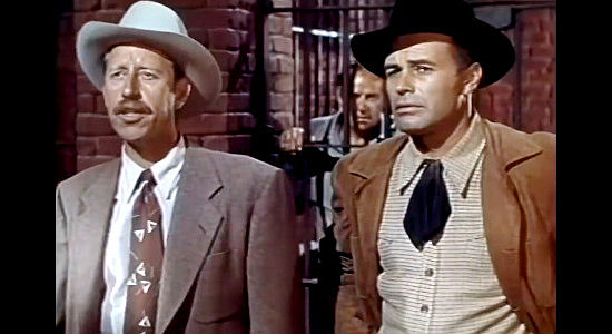 Frank Ferguson as Eldridge Haskell, corrupt supervisor of Eureka, with Jim Tullett (House Peters Jr.), his hand-picked deputy in Oklahoma Annie (1952)
