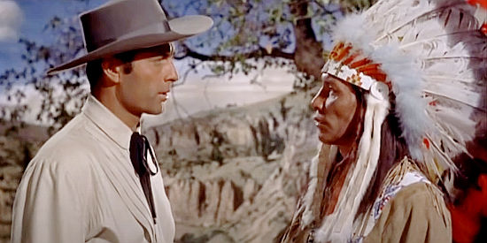 George Montgomery as Bat Masterson, negotiating with Chief Yellow Hawk (Jay Silverheels) in Masterson of Kansas (1954)