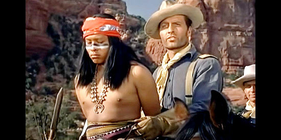 George Montgomery as Capt Chase McCloud with his captive, Geronimo's son Tobai (Robert Foster Dover) in Indian Uprising (1952)