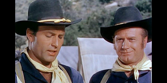 George Montgomery as Jack McCall reminding cousin Bat (James Seay) of family obligations in Jack McCall, Desperado (1954)