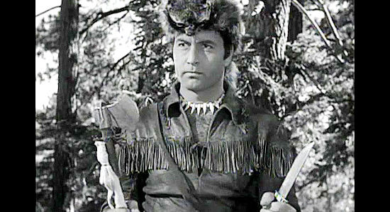 George Montgomery as Nat Cutler, aka Hawkeye, armed and ready for a showdown in The Iroquois Trail (1950)