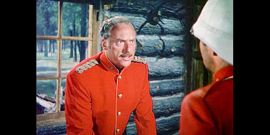 Howard Petrie as Inspector Frazer, giving MacDonald his marching orders in Pony Soldier (1952)