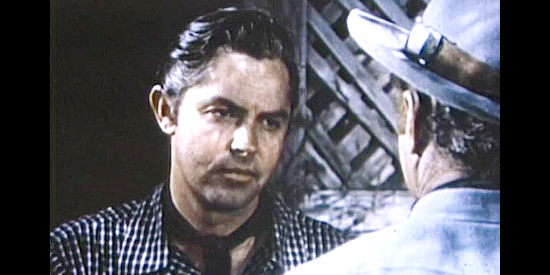 Jack Buetel as Frank James, trying to steer his brother clear of female trouble in Jesse James' Women (1954)