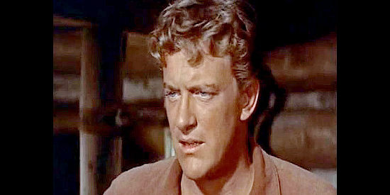 James Arness as Esau Hamilton, unsure how to help a critically sick baby daughter in Many Rivers to Cross (1955)