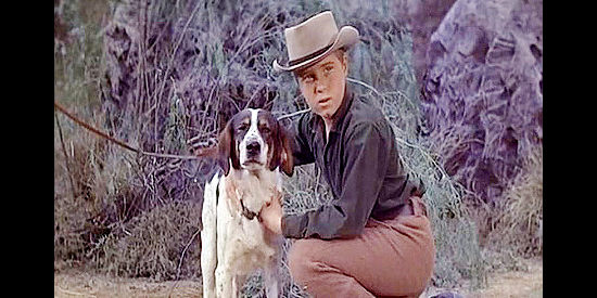 Jerry Hartleben as Bucky Morse with his dog Bud, wondering how to tame a wild stallion in King of the Wild Stallions (1959)