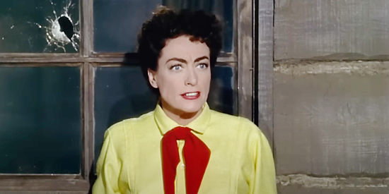 Joan Crawford as Vienna, startled by gunfire aimed her way in Johnny Guitar (1954)