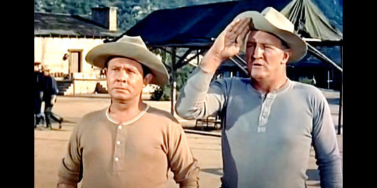 John Call as Sgt. Timothy J. Clancy and Joe Sawyer as Sgt. Keough, two of the men serving under Capt. McCloud in Indian Uprising (1952)