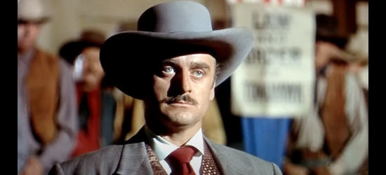 John Dehner as Ranse Jackman, ready for a showdown with Alec Black and the sheepman in The Man from Bitter Ridge (1955)