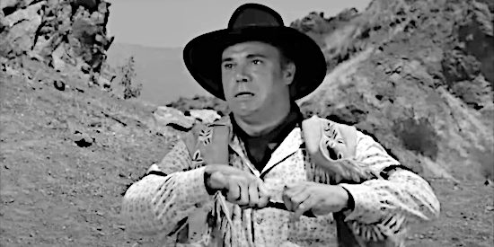 John Doucette as Maroon henchman Harry Farrow, ready to finish off a wounded sheriff with his knife in The Phantom Stagecoach (1957)