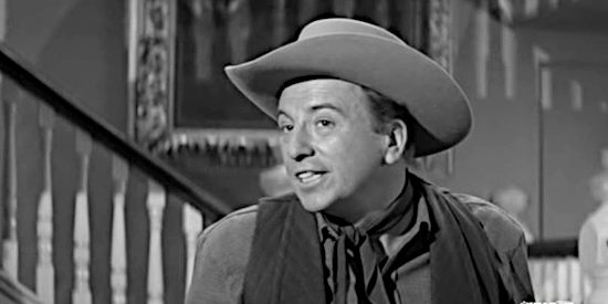 Ken Lynch as Buckstorm Corley, the first member of the Corley family to test himself against Maybe Smith's new gun in Man or Gun (1958)