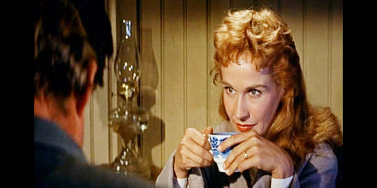 Kim Hunter as Mary Kingman, getting to know Ward Hogan better over a cup of coffee in Money, Women and Guns (1958)