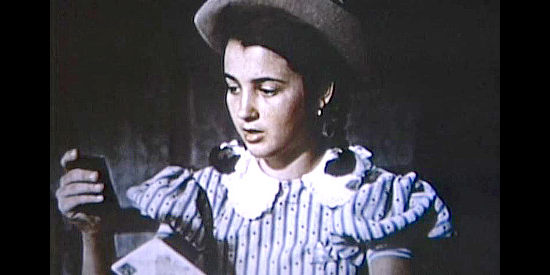 Laura Lee as Angel Botts, the young sheriff's daughter who has a crush on Jesse James in Jesse James' Women (1954)