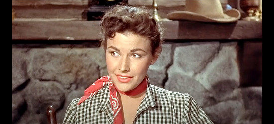Mara Corday as Holly Kenton, the girl Jeff Carr and Alec Black would both like to claim as their own in The Man from Bitter Ridge (1955)