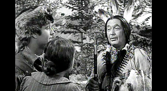 Monte Blue as Sagamore, Hawkeye's faithful sidekick, meeting Nat Cutler's mother in The Iroquois Trail (1950)