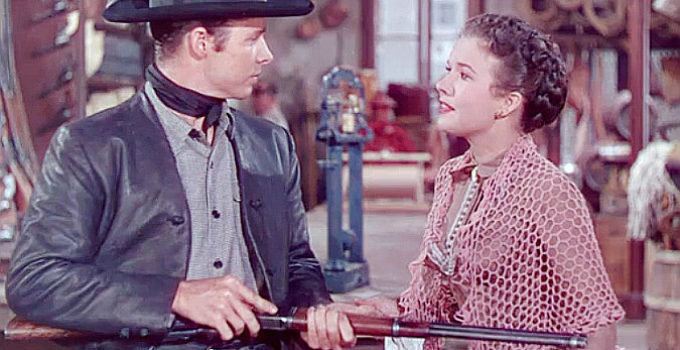 Audie Murphy as Billy the Kid with Gale Storm as Irene Kaine in The Kid from Texas (1950)