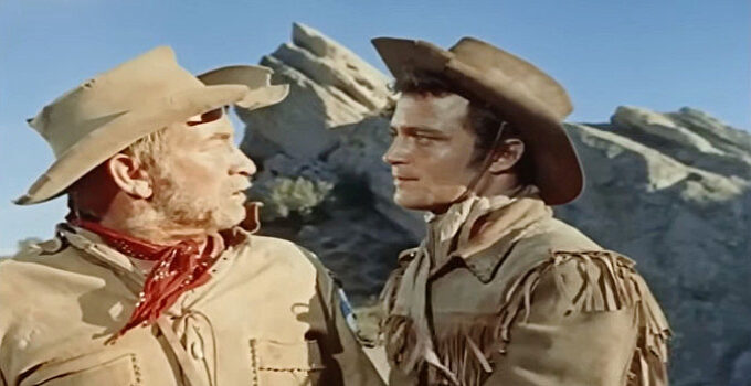Chill Wills as Tobias Taylor and Lance Fuller as Jason Clay, debating the mix of women and guns in Kentucky Rifle (1956)