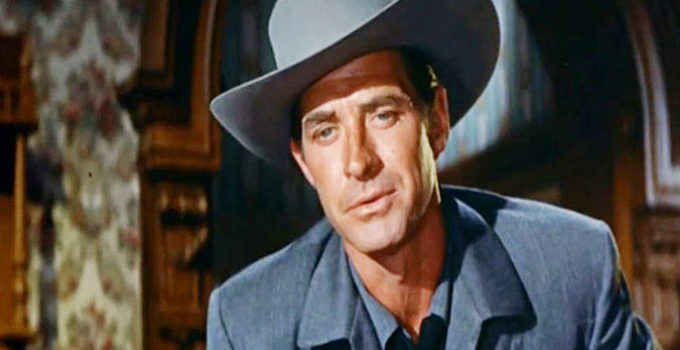 Jock Mahoney as 'Silver' Ward Hogan, trying to find Ben Merriweather's heirs and killler in Money, Women and Guns (1958)