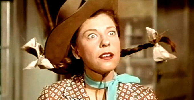Judy Canova as Judy Canova, reacting to meeting Eureka's handsome new sheriff, Dan Fraser, in Oklahoma Annie (1952)