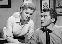 Kathleen Crowley as Fran Maroon, dealing with flirting by Glen Hayden (William Bishop) while mending his arm in The Phantom Stagecoach (1957)