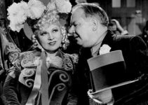 Mae West as Flower Belle Lee lavished with attention by Cuthbert Twillie (W.C. Fields) in My Little Chickadee (1940)