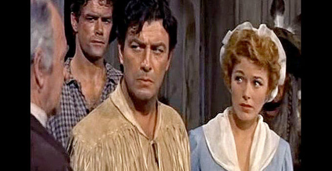 Robert Taylor as an upset Bushrod Gentry with Mary Stuart Cherne (Eleanor Parker) in Many Rivers to Cross (1955)