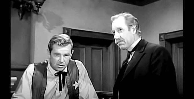 Sterling Hayden as Sheriff Sam Galt with Frank Ferguson as District Attorney Holloway in The Iron Sheriff (1957)