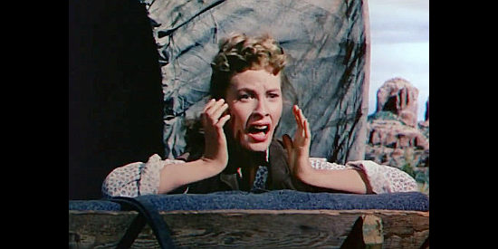 Penny Edwards as Emerald Neeley, watching her father being attacked by Indians in Pony Soldier (1952)