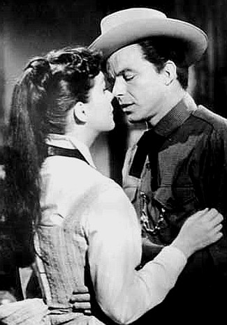 Phyllis Kirk as Mary Dark with Frank Sinatra as Johnny Concho in Johnny Concho (1956)