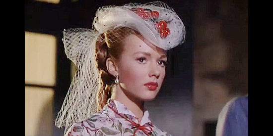 Piper Laurie as Angelique Dureau, not sure whether to hate or be intrigued by a riverboat gambler in Mississippi Gambler (1953)