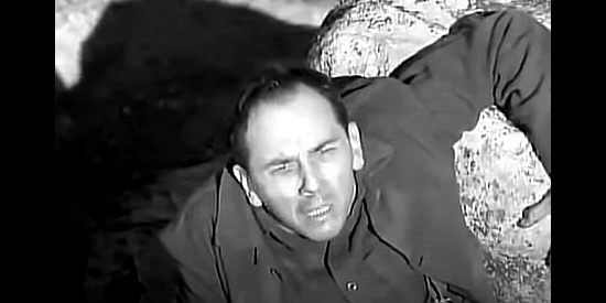 Ray Walker as Bilson, a man with a secret key to Benjie's trial in The Iron Sheriff (1957)