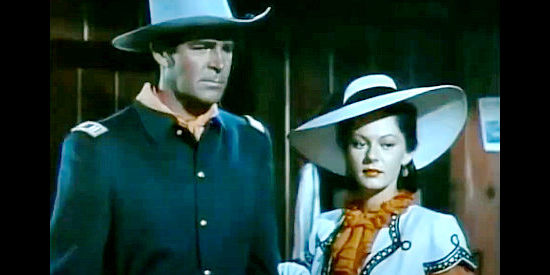 Rod Cameron as Capt. Calhoun trying to rekindle a romance with Lia Wilson (Lorna Gray, aka Adrian Booth) in Oh! Susanna (1951)