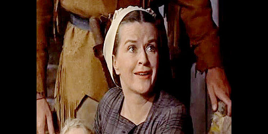 Rosemary DeCamp as Lucy Hamilton, fretting over her sick daughter in Many Rivers to Cross (1955)