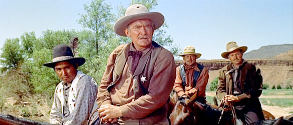 Roy Roberts as Sheriff Larrabee, interrupting Don Kehoe's stay at Wagon Mound in The King and Four Queens (1956)
