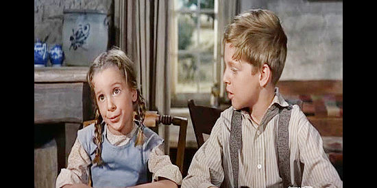 Shari Lee Bernath as Michelle DuBois and Jimmy Carter as her brother Paul, learning frontier English from Bleeker in The Jayhawkers! (1959)