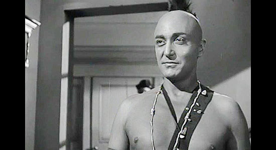 Sheldon Leonard as Ogane, lusting over the thought of capturing prtty Marion Thorne in The Iroquois Trail (1950)