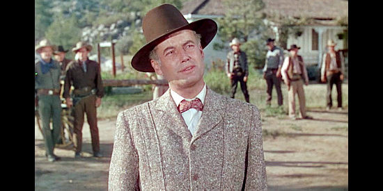 Shepperd Strudwick as Roger Jameson, the rancher who takes Billy under his wings in The Kid from Texas (1950)