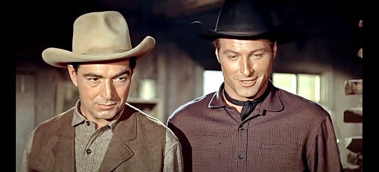 Stephen McNally as Alec Black and Lex Barker as Jeff Carr, teaming up to find the truth behind the trouble in Tomahawk in The Man from Bitter Ridge (1955)