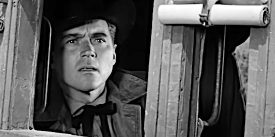 William Bishop as Glen Hayden, running into immediate trouble aboard a Patterson stagecoach in The Phantom Stagecoach (1957)